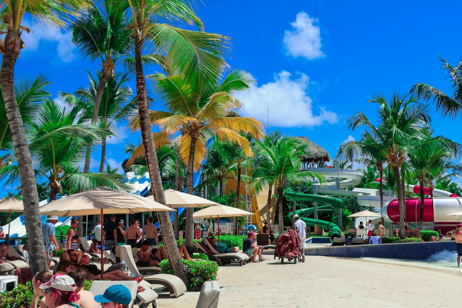 People are relaxing on a beautiful tropical beach.